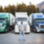 black-man-truck-driver-near-his-truck-parked-in-a-2023-11-27-04-50-50-utc-min.jpg