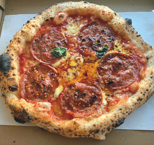 Saltbox Wadebridge street food market in north Cornwall built from stacked shipping containers near the Camel Estuary. Street food venue in Wadebridge Cornwall bringing together independent food vendors, craft drinks and casual dining by the north Cornish coast. Saltbox Wadebridge food hub offering international street food including wood fired pizza, tacos, tapas, burgers and Asian cuisine from artisan chefs. Unique container food market in north Cornwall inspired by global street food culture from Australia, Spain, Italy and Mexico. Casual dining destination in Wadebridge near Padstow and the Camel Trail featuring outdoor terrace seating and open kitchen street food vendors. Craftworks Kitchen street food serving burgers, burritos, tacos and dirty fries at Saltbox Wadebridge Cornwall. Woody’s Pizza traditional Neapolitan style pizza made with fresh dough and quality Italian ingredients in north Cornwall. Graze Tapas Mediterranean and Australian inspired small plates and BBQ flavours served at Saltbox Wadebridge. Spicesea UK Ayurvedic inspired street food focusing on balanced flavours and healthy cuisine in Wadebridge Cornwall. Salt Bar Wadebridge serving local craft beers, Cornish spirits, wine and cocktails to accompany street food vendors. Container food market concept in Cornwall combining modular architecture, casual dining and independent food businesses. Family friendly food venue in Wadebridge Cornwall attracting locals, surfers, skaters and visitors exploring north Cornwall. Destination street food market near Padstow and the Camel Estuary celebrating Cornwall’s growing casual dining scene. North Cornwall food destination offering artisan street food, cocktails and live social atmosphere near the Camel Trail. Saltbox Wadebridge Cornwall modern food market showcasing independent chefs, international cuisine and local Cornish drinks.