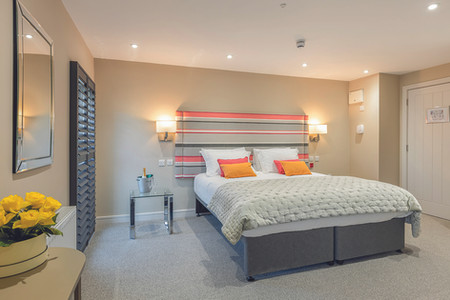 Polzeath Beach House boutique hotel overlooking Polzeath Beach on the north Cornwall coast. Luxury beachfront accommodation in Polzeath Cornwall with sea view apartments and hotel rooms. Polzeath Beach House surfside hotel near the Atlantic Ocean and Polzeath surf beach. North Cornwall coastal hotel offering contemporary apartments with ocean views. Polzeath Beach House accommodation near Daymer Bay and the Camel Estuary. Boutique beach hotel in Polzeath Cornwall ideal for surfing holidays and coastal escapes. Atlantic Bar and Kitchen at Polzeath Beach House serving wood fired pizza and seafood. Beachfront restaurant in Polzeath Cornwall overlooking the Atlantic and surf. Polzeath Beach House hotel accommodation steps from the beach and dunes. North Cornwall surf hotel near Rock, Daymer Bay and the South West Coast Path. Polzeath Beach House family friendly apartments with sea view balconies. Coastal boutique hotel in Polzeath Cornwall with modern Scandinavian inspired interiors. Polzeath Beach House accommodation popular with surfers visiting north Cornwall. Atlantic Bar and Kitchen Polzeath serving local seafood, steak and Harbour Brewing beer. Beachfront hotel in Polzeath Cornwall offering luxury coastal stays and surfside dining.