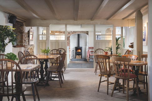 The Plume of Feathers Mitchell historic coaching inn and restaurant near Newquay Cornwall serving modern British pub food using seasonal Cornish ingredients. Traditional Cornish pub restaurant in Mitchell Cornwall offering locally sourced seafood, meat and seasonal produce from the South West. The Plume of Feathers Mitchell award winning country pub with rooms combining historic 16th century coaching inn character with contemporary British cuisine. Restaurant near Newquay and Truro Cornwall serving classic British dishes with creative twists by Head Chef Andrew Dudley. Cornish gastropub dining featuring fresh local fish, ham and eggs, fish and chips and seasonal vegetable dishes inspired by Cornwall’s land and sea. Historic inn with accommodation in Mitchell Cornwall offering boutique rooms, garden dining and relaxed countryside hospitality. Modern British restaurant in Cornwall celebrating regional produce from Cornish farmers, fishermen and artisan suppliers. Country pub restaurant near the A30 in Mitchell Cornwall popular with locals and visitors exploring mid Cornwall and the north coast. Seasonal Cornish menu highlighting seafood, wild garlic, local vegetables and regional meats prepared by experienced chef Andrew Dudley. Boutique pub with rooms in Cornwall combining historic architecture, low oak beams and contemporary dining. Destination pub restaurant in Cornwall near Newquay, Truro and St Austell serving quality British food and local ales. Cornish dining pub experience featuring local beers, craft spirits and wines paired with seasonal menus. Historic Cornish coaching inn offering food, drink and accommodation in a traditional village setting. Modern gastropub cuisine in Cornwall blending home cooking heritage with restaurant quality dishes. The Plume of Feathers Mitchell Cornwall known for classic pub favourites, creative desserts and locally sourced ingredients.