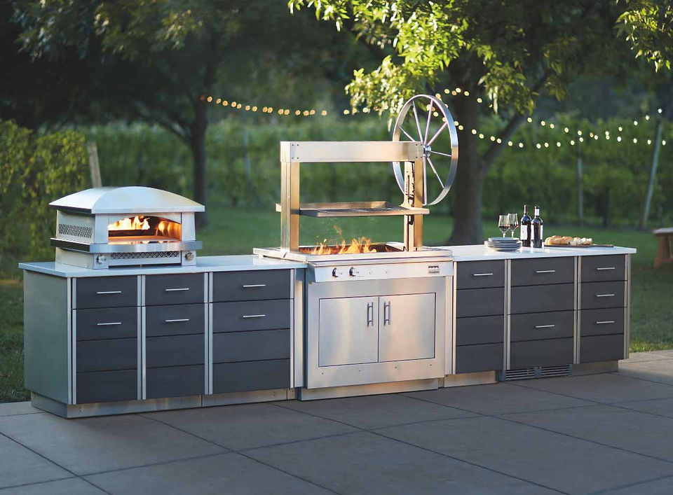 luxury kitchen design Cornwall UK, indoor and outdoor kitchen design trends UK, contemporary kitchen architecture Cornwall homes, outdoor kitchen living and al fresco cooking UK homes, premium kitchen appliances and outdoor grills UK, modern kitchen lifestyle design Cornwall properties, high end kitchen design for luxury homes UK, integrated indoor outdoor living kitchen design, bespoke luxury kitchen spaces Cornwall UK, modern outdoor entertaining kitchens UK homes