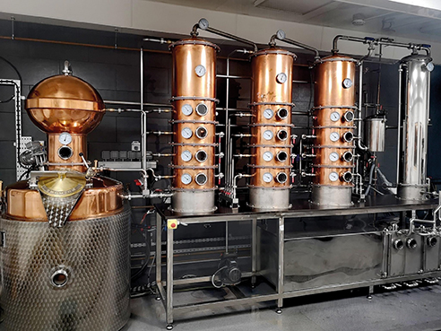 Copperfish Distillery Looe Cornwall craft distillery producing rum, moonshine and Cornish spirits made from scratch. Copperfish Distillery Buller Quay Looe small batch rum distillery creating authentic Cornish spirits from cane to glass. Artisan rum distillery in Looe Cornwall specialising in barrel aged rum crafted using traditional copper stills. Copperfish Gold Rum Cornwall award winning rum matured in oak barrels and recognised by Taste of the West awards. Craft rum producer in Cornwall making spiced rum, pineapple rum and limited edition flavoured spirits. Copperfish Distillery Cornwall producing small batch spirits including black rum, spiced rum and chocolate orange rum. Cornish craft distillery creating rum from fermented cane sugar and molasses using traditional distillation techniques. Looe distillery tours and tastings offering visitors insight into rum fermentation, distillation and barrel ageing. Copperfish Distillery Cornwall producing Moonshine spirits made from local corn, barley and wheat. Cornish Moonshine liqueurs crafted from grain spirit and available in a range of flavoured expressions. Kerbon Cornish bourbon style spirit made from locally grown corn, barley and wheat aged in oak barrels. Looe craft spirits brand celebrating Cornwall’s fishing and mining heritage through the Copperfish name and design. Distillery experience in Looe Cornwall offering tastings, immersive distilling workshops and riverfront views. Cornwall rum distillery producing award winning spirits recognised by Taste of the West awards. Copperfish Distillery Looe championing Cornish craft spirits and small batch distilling with locally inspired flavours.