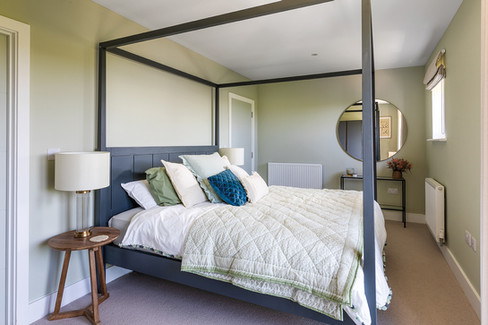 sustainable new build homes designed for modern family living in coastal Cornwall. Energy efficient contemporary houses featuring air source heat pumps and solar panels. Luxury eco homes combining modern architecture with low energy technologies. Contemporary family homes with open plan living and landscaped gardens near the Cornish coast. Sustainable residential developments designed to reduce energy use and long term living costs. Modern eco friendly houses with underfloor heating and renewable energy systems. Luxury coastal homes built with high quality materials and energy efficient construction. Contemporary new build homes designed for comfortable, sustainable living. Energy conscious residential architecture with photovoltaic panels and EV charging infrastructure. Sustainable luxury homes offering modern design and environmentally responsible living.