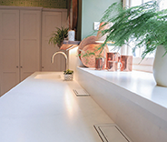 granite, quartz and sintered stone worktops handcrafted by Duke Stone of Cornwall for kitchens and bathrooms. Bespoke stone kitchen worktops designed and installed by stonemasons in Cornwall. Luxury granite kitchen countertops fabricated and fitted for Cornwall homes and new build developments. Quartz worktops and custom stone surfaces created by Duke Stone of Cornwall. Sintered stone kitchen worktops offering durable and heat resistant surfaces for modern kitchens. Natural stone countertops crafted from granite and quartz for bespoke kitchen design in Cornwall. Stone bathroom vanities, flooring and interior stone surfaces supplied by Cornwall stonemasons. Custom cut stone worktops manufactured and installed for luxury homes across Cornwall. Contemporary kitchen design featuring polished granite, quartz and sintered stone surfaces. Traditional stonemasonry craftsmanship producing bespoke kitchen worktops and stone interiors. Natural stone surfaces sourced and fabricated by Duke Stone workshop in Cornwall. High end kitchen countertops combining durability, natural beauty and bespoke fabrication. Luxury interior stone design for kitchens, bathrooms and architectural features in Cornwall homes. Professional stone templating, fabrication and installation services by Duke Stone of Cornwall. Cornish stonemasons specialising in granite, quartz and sintered stone kitchen worktops.