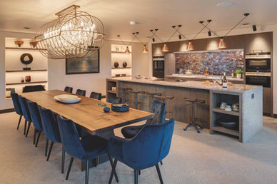 Woodford Architecture and Interiors lighting design Cornwall, luxury architectural lighting design Cornwall homes, integrated architecture and interior design Cornwall UK, Gavin and Sarah Woodford architects Cornwall lighting concepts, bespoke residential lighting design Cornwall coastal homes, Lutron smart lighting systems luxury homes Cornwall, contemporary architectural lighting Cornwall interior design, layered lighting design kitchens living spaces Cornwall, luxury home lighting design Woodford Architecture interiors, high end residential architecture and interiors Cornwall UK