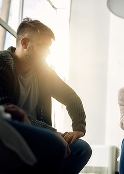 young-woman-feeling-uncertain-while-attending-group-therapy-meeting.jpg