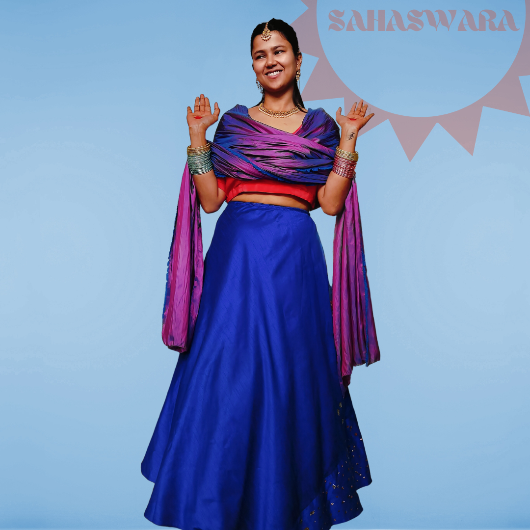 Raw silk Blue Lehenga with pink satin blouse, wore by a model