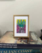 Thumbnail: original acrylic painting of blue flowers inside a black and white striped vase sitting on pink and purple plaid with yellow