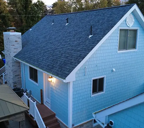 CertainTeed Cedar Impressions D7 straight edge siding in Perfection Bermuda Blue installed on a residential home in Brick, NJ by Hill Top Construction Solutions