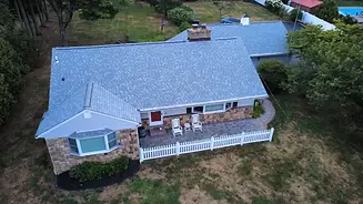 "A premium CertainTeed Landmark Pro roof replacement in Cobblestone featuring custom-fabricated chimney flashing in Summit, NJ. This installation showcases expert leak-protection details and architectural shingles for a Union County home."