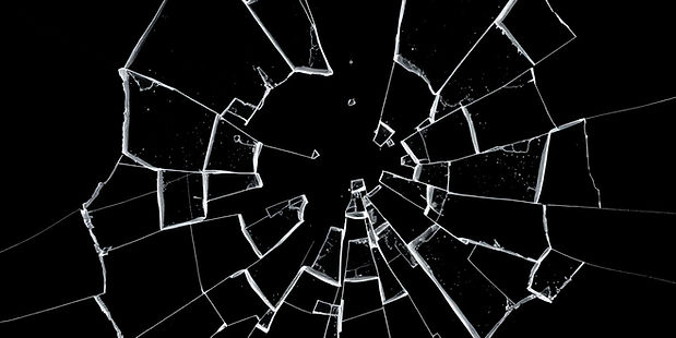 black backround with broken glass.jpg