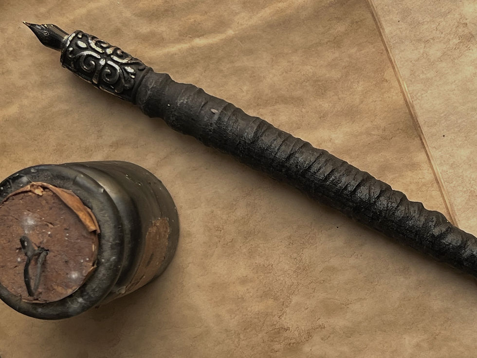 Handcarved wooden ink dip pen with metal bead reinforced nib holde