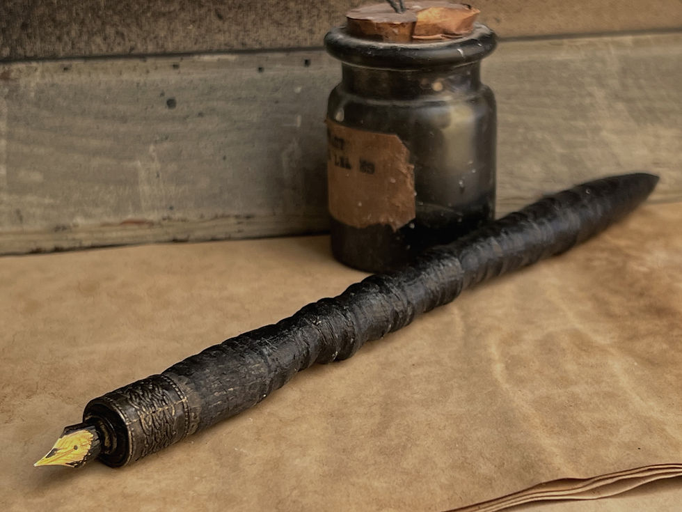Handcarved wooden ink dip pen with metal bead reinforced nib holde