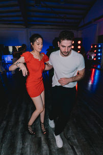Man and woman dancing salsa