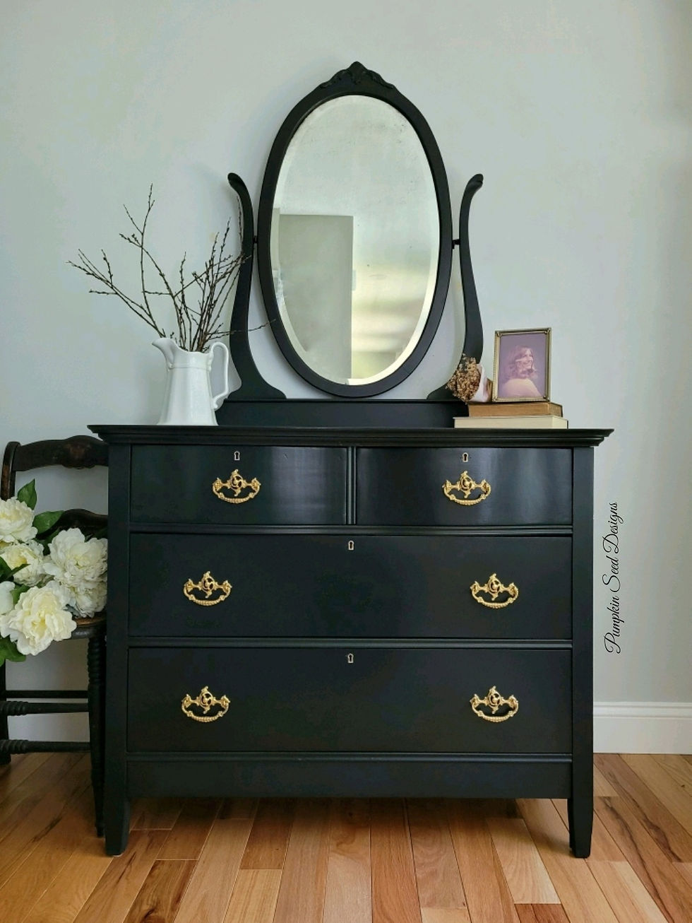4-Drawer Black Serpentine Dresser