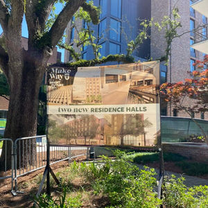 Sign outside of Tulane University showing their plans for two new dorm halls in 2023.
