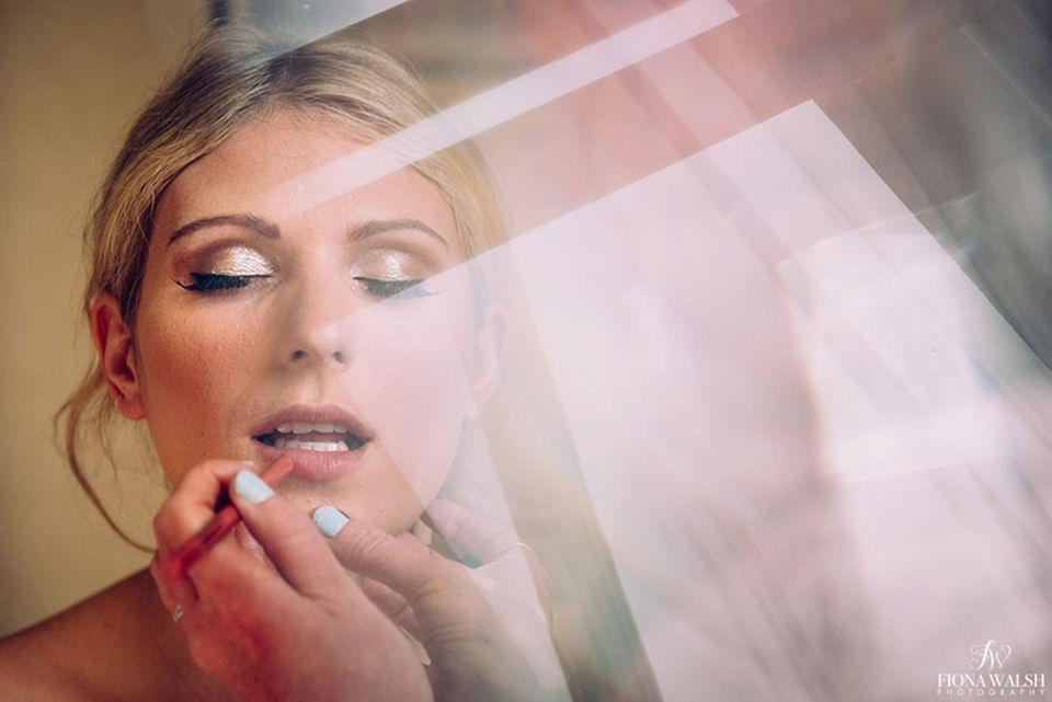 Soft glam bridal makeup with glowing skin, ideal for a luxury wedding at Pynes House in Devon