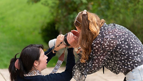 Photographer Samantha showing client a sneak peek of photoshoot, Ilminster