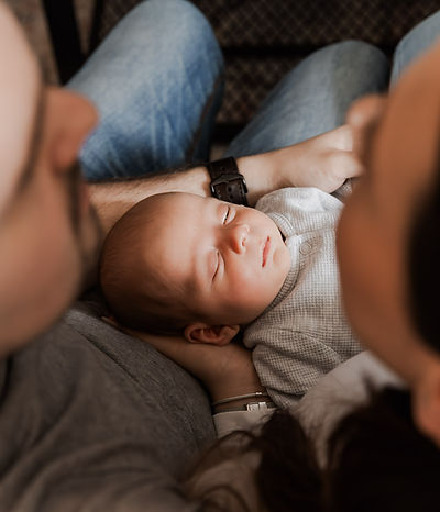 Stylish lifestyle photoshoot held in families high end lounge, warm tones with baby. Yeovil