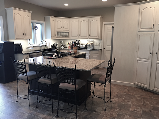 Central, PA Oak kitchen cabinets painted white with custom glaze finish