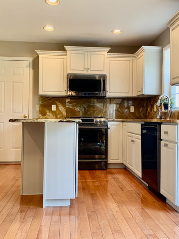 White Cabinets by Divine Arterior Design