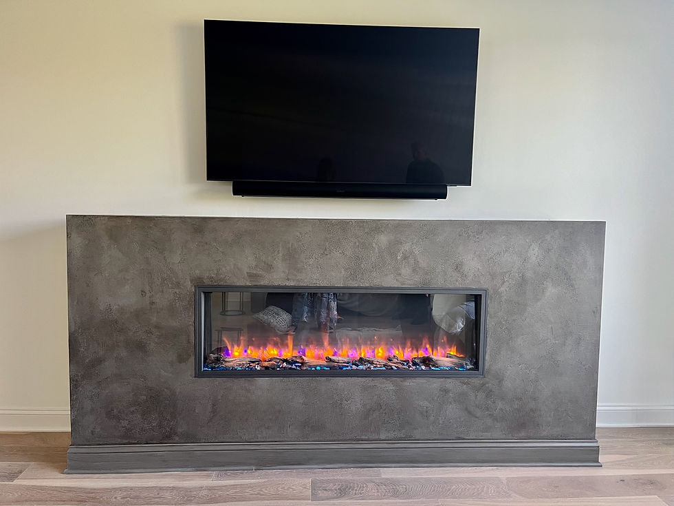 A modern fireplace finished with plaster that looks like concrete.