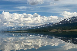 Lake reflection snowy mountains western Mongolia