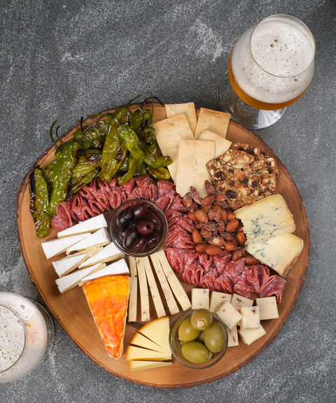 grilled shishito peppers with lime and salt (charcuterie) with fresh hop ipa by Jon Page.j