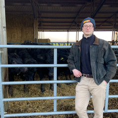 Edmund with cows.jpeg
