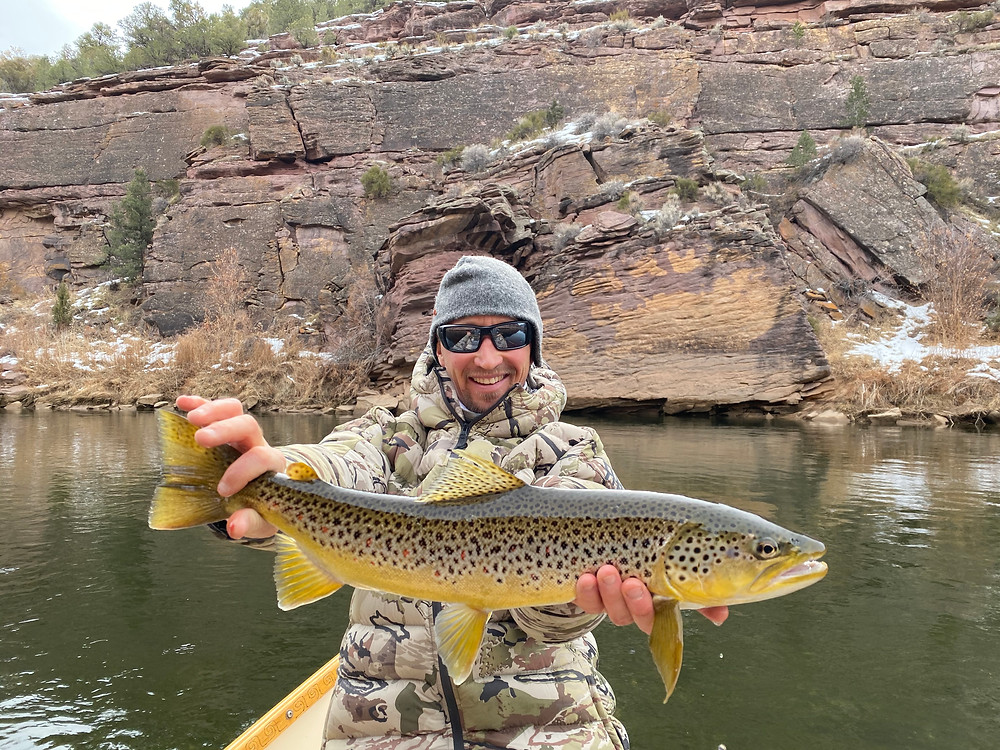Fly Fishing Guide JD Magee with a streamer caught Brown Trout