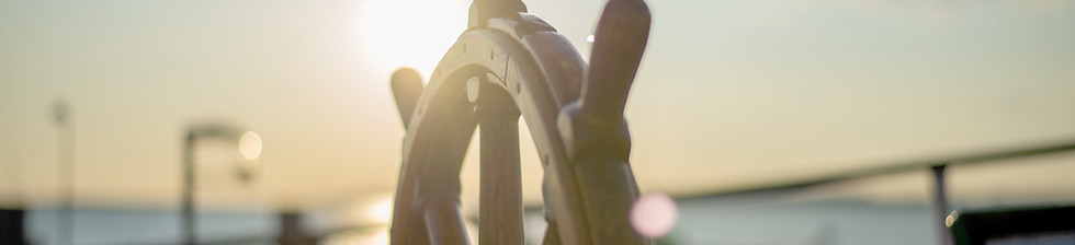 Boat Wheel Sunset