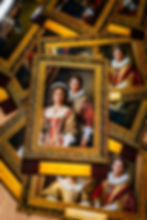 Portrait cards in ornate gold frames depict a man and woman in regal attire. Labels read "Hartley Family." Rich colors dominate the scene.
