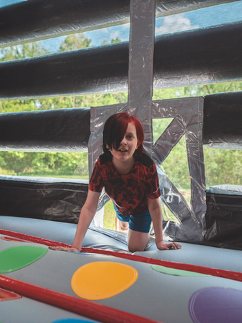 kid entering bounce house