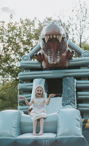 Girl on Trex Bounce House Slide