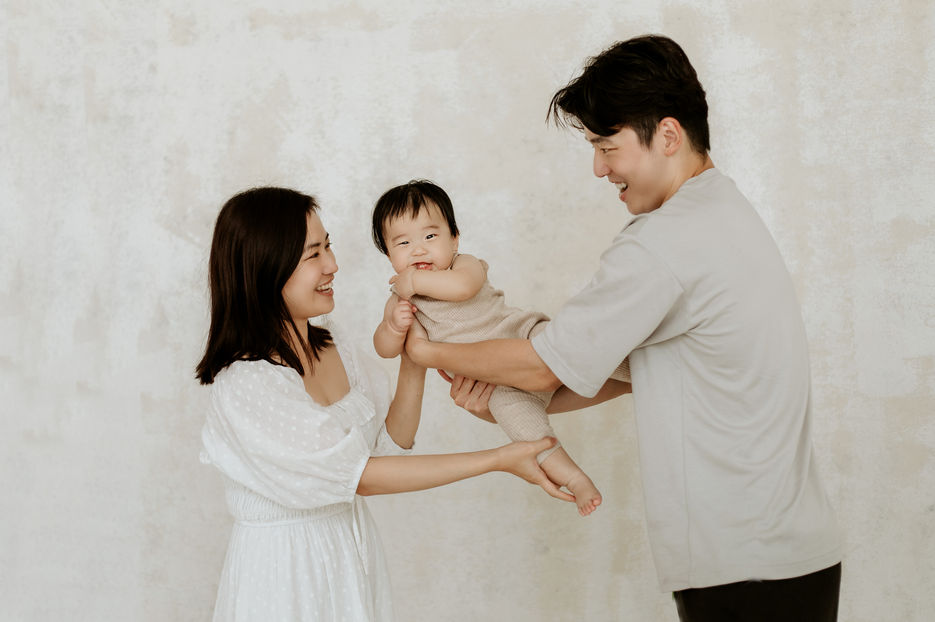 young family with newborn