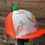 Thumbnail: Carrot and Pea orange hat silk 