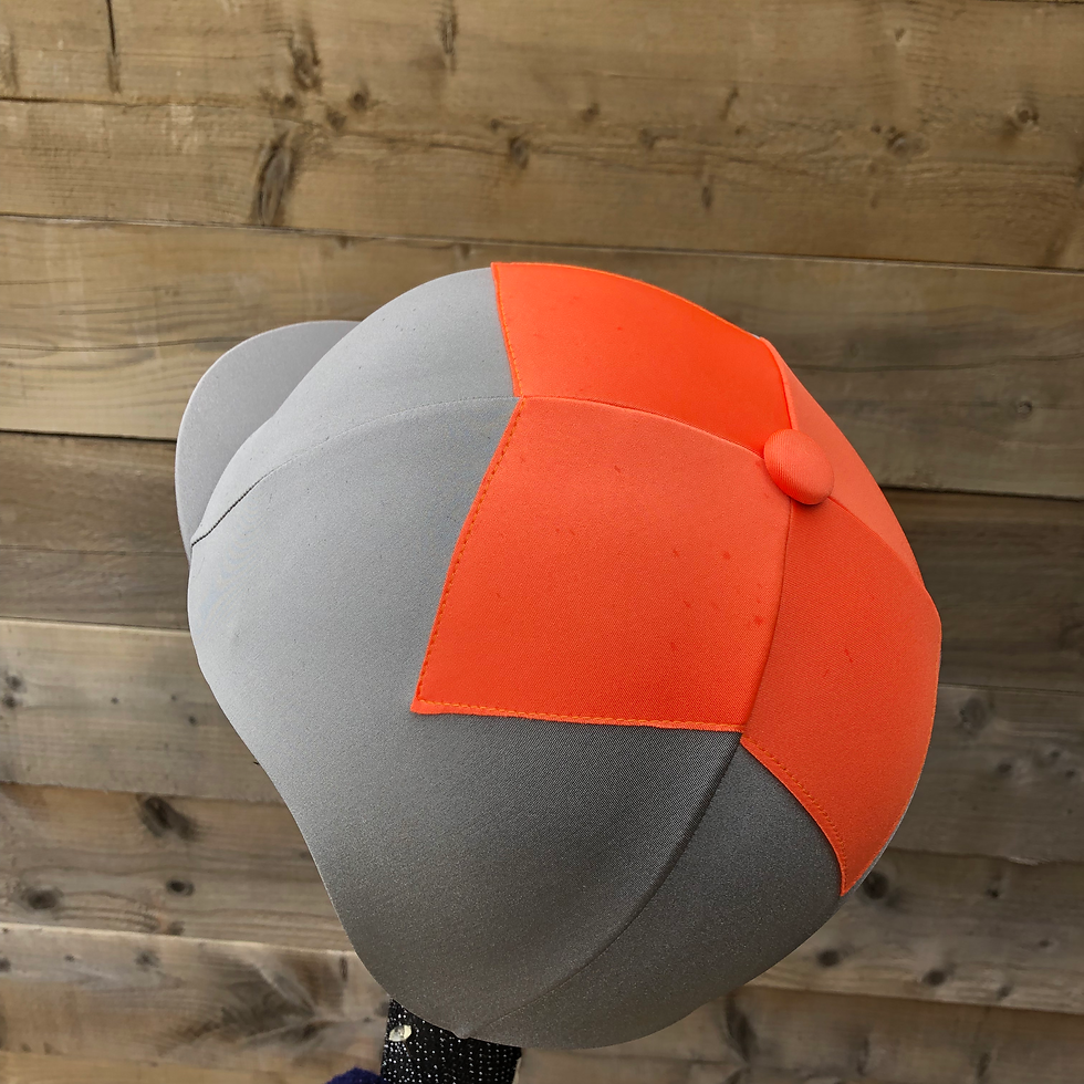 Thumbnail: Mounted games black and orange riding hat silk 
