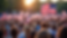 High angle view of a large crowd waving American flags at a political rally