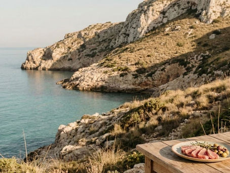 Mediterranean coastal landscape showing natural terrain and sea influence on food origins. Mediterranean agricultural land shaped by sun, soil, and seasonal rhythms. Stone terraces and mineral-rich soil defining Mediterranean terroir.