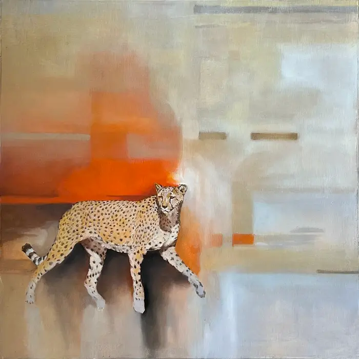 A cheetah poised in anticipation, set against an abstract backdrop