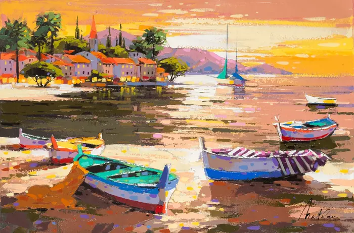  Colorful fishing boats rest near the shore under a golden sunset sky, with a village and palm trees reflected on calm water.