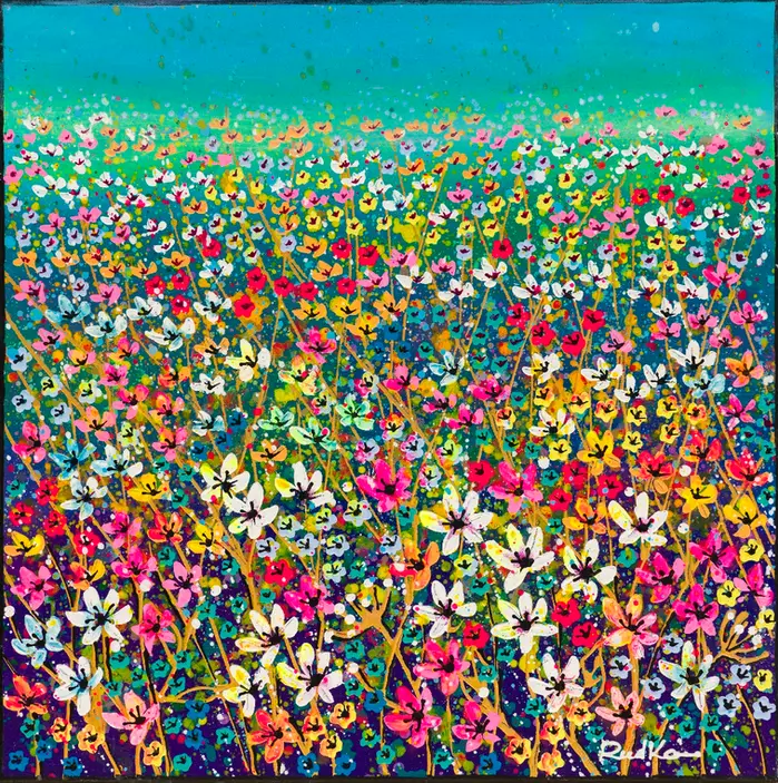  A vivid field of layered wildflowers in pink, yellow, white, and red beneath a turquoise sky.
