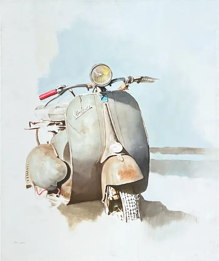 A vintage Vespa against a muted backdrop