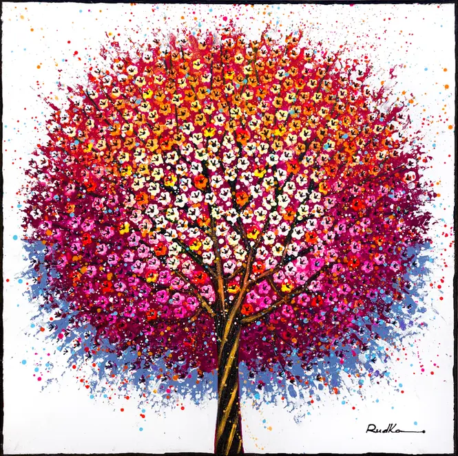  A single round tree with dense, multicolored petals on a white background.