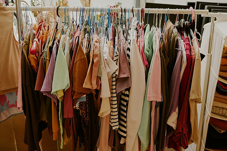 varied-array-of-clothes-hanging-on-rack-in-store-2024-08-15-23-38-20-utc.jpg