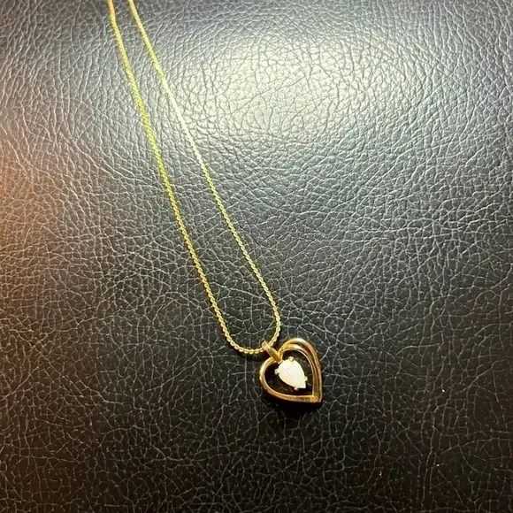 Thumbnail: Heart in a Cage 16” Gold with Pear Shaped Opal Stone Necklace