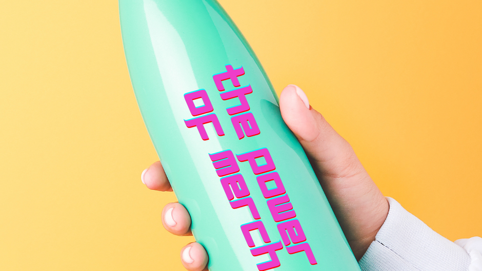 Hand holding bottle which says The Power of Merch alongside the side