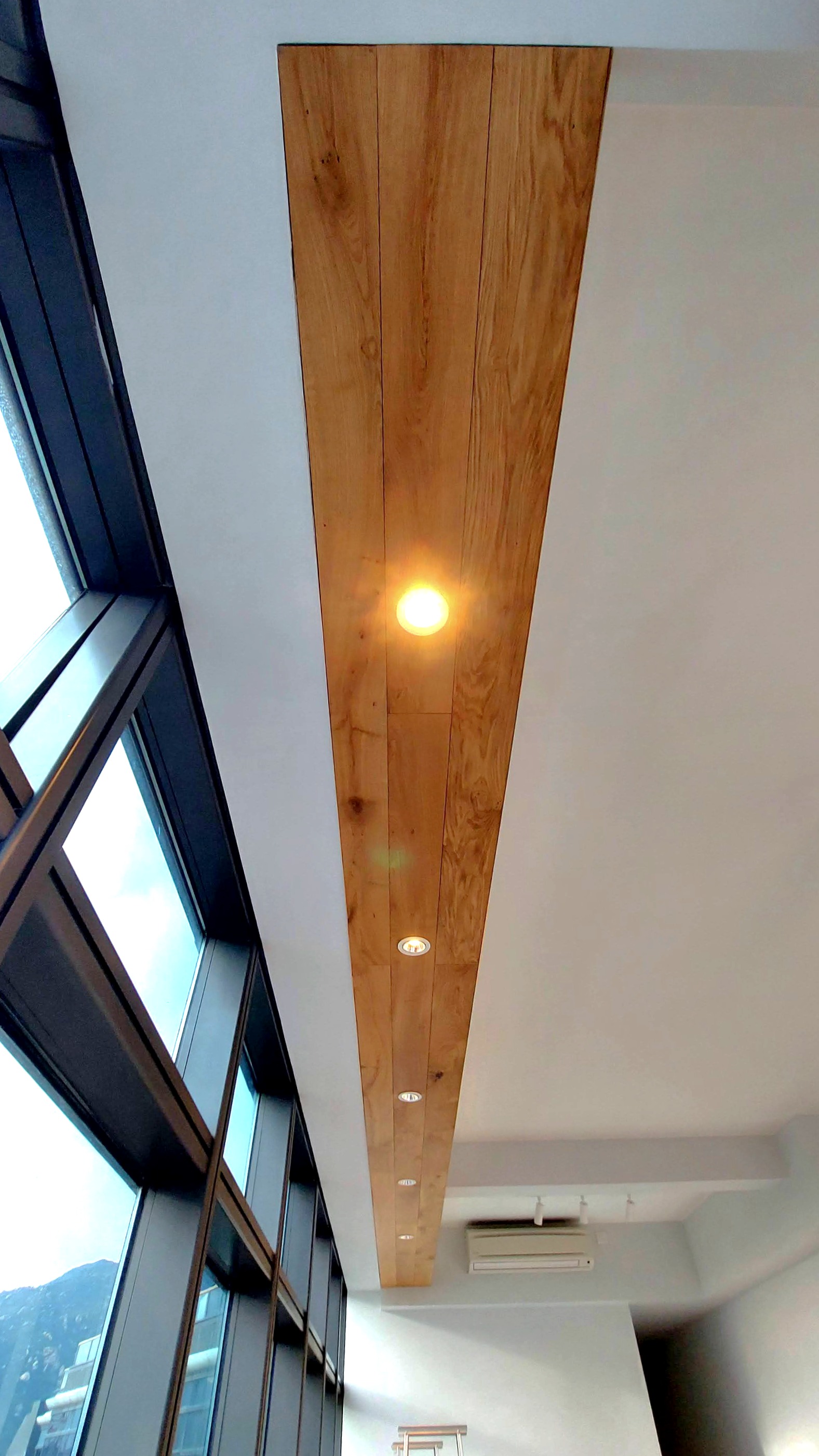 Indoor oak wood cover for bulkhead ceiling