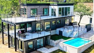 Container home mansion with pool and extensive decking