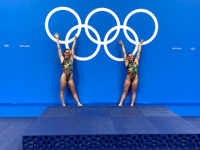 Team Phoenix athletes Clarissa Johnston and Laura Strugnell at the Tokyo Olympic games after their Free Duet swim.
